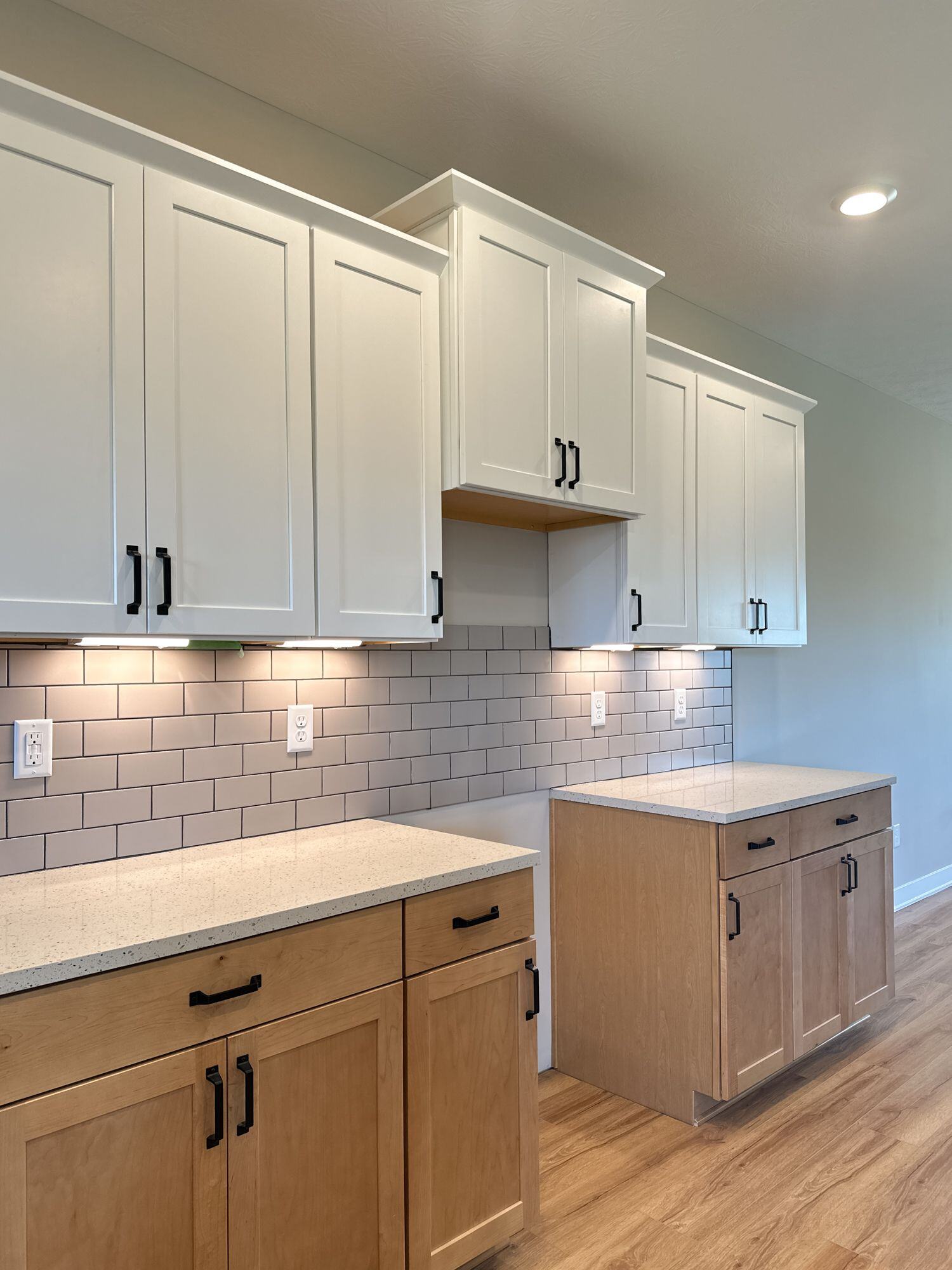 Subway tile and two-toned cabinets